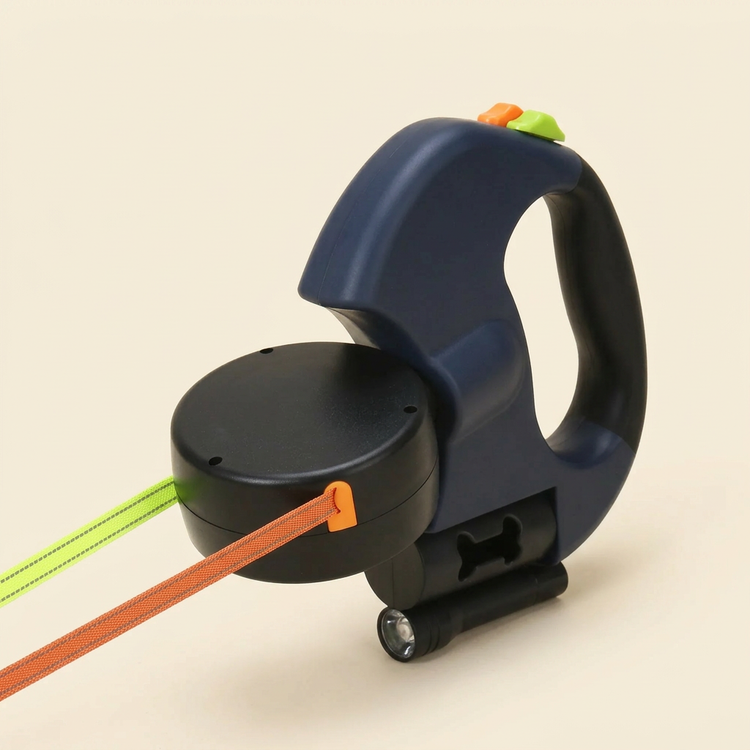 Navy dual retractable dog leash with light and two colored leads on a cream background