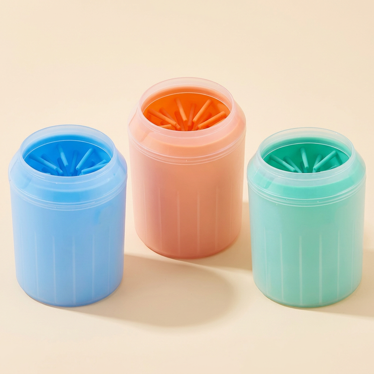 Dog paw cleaning cups in blue, orange and green
